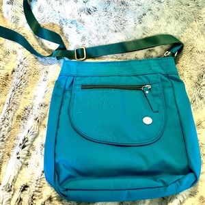 Teal crossbody travel purse